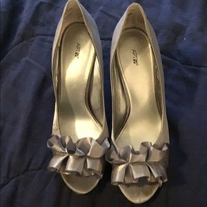 Beautiful silver peep-toe high heels with ruffle
